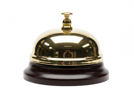 Classic brass service bell with a polished golden dome and dark wooden base isolated on transparent background