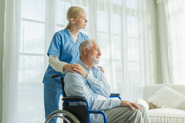 Help support retirement healthcare. Nurse helping old man in wheelchair. Patient and woman in nursing home for medical caregiver. Nurse taking care of paralyzed man in chair for people with disability