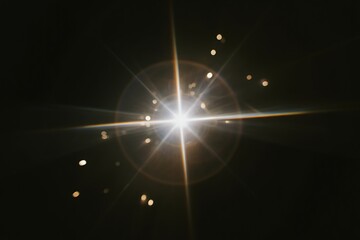 Bright starburst lens flare with bokeh on dark background