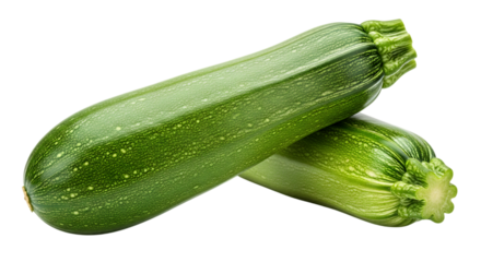 Two fresh green zucchini vegetables with textured skin and light speckles are isolated on a stark black background showcasing their natural beauty and healthy organic produce