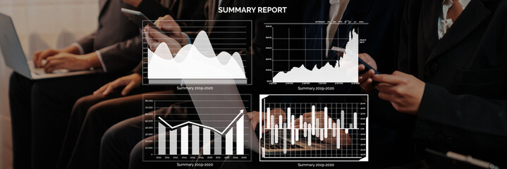 Business professionals engage with data on laptops and mobile devices, analyzing summary report charts to understand key performance metrics and trends. Axiom