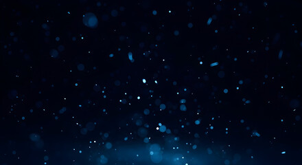 Obraz premium blue bokeh lights drifting in darkness, minimal futuristic winter light concept.