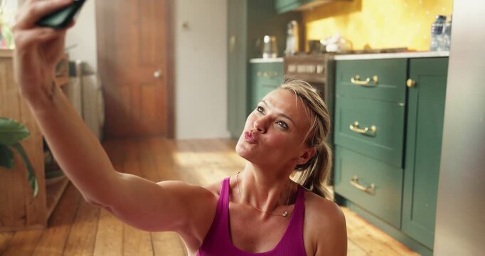 Happy woman, yoga and selfie with picture for online workout session, photography or memory in home. Active, female person or smile with peace sign for capture moment, exercise or health and wellness