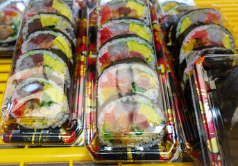 Fototapeta premium Packaged Kimbap Rolls in Store Display