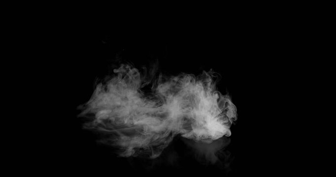Super Slow Motion of White Rounded Smoke Texture Isolated on Black Background. Filmed on High Speed Cinema Camera, 500fps. VFX element for overlay.