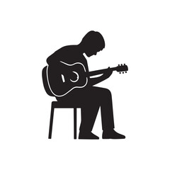 Silhouette of a person sitting on a stool playing an acoustic guitar