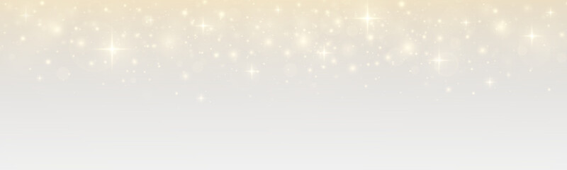 Shimmering rain of stars with luxurious glamour. Festive sparkle and stardust on a bright holiday background.
