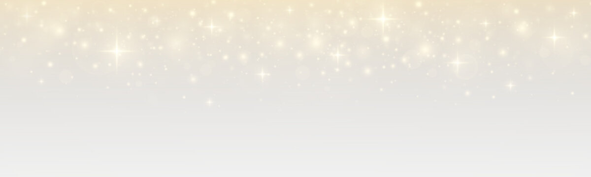 Shimmering rain of stars with luxurious glamour. Festive sparkle and stardust on a bright holiday background.