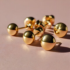 Elegant gold earrings reflecting sophistication. The earrings gleam with a timeless allure, capturing the essence of luxury. 