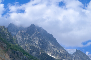 Scenic view of the rugged mountains of Svaneti, Georgia, featuring peaks, valleys, and natural landscape under natural light.