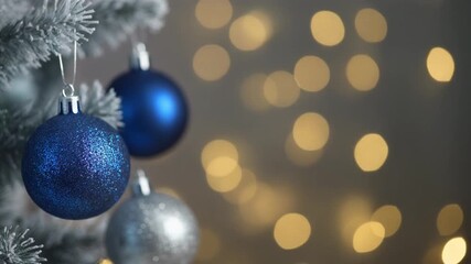 Christmas, blue and silver ornaments, bokeh background, mp4 video. AI - Powered by Adobe