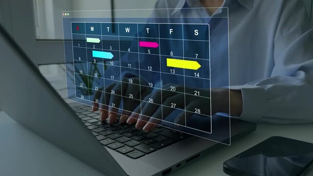 Project manager updating tasks and milestones progress planning with calendar interface for company.Business Project Management System.	

