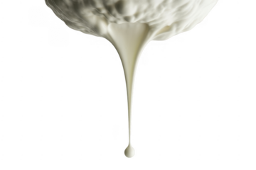 White liquid dripping from textured mass isolated on a transparent background
