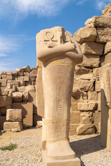 Egypt, Luxor, 01.02.2022. Ancient Sandstone Ruins of Old  Egyptian God in the Karnak Temple Complex near Luxor, Egypt