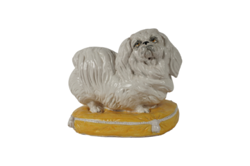 Pekingese Dog Ceramic Figurine on Yellow Cushion