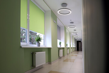 Stylish hallway with windows at school, low angle view