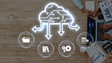 This image illustrates cloud technology integration with a focus on data management and teamwork, showcasing a modern office setting suitable for digital transformation. Raster