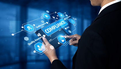 A business professional engages with a digital compliance interface, emphasizing the importance of quality assurance and policy management in a modern workplace. Tessel
