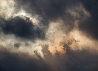 Sun Obscured by Storm Clouds