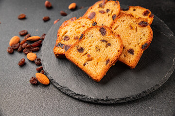 Fruit cake sweet pastry fruitcake dessert dried fruits, nuts traditional baked goods natural product tasty snack fresh delicious gourmet food background on the table rustic top view copy space
