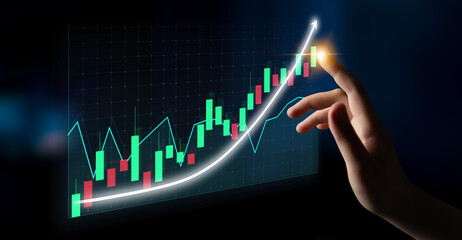 A hand reaching towards a stock market graph illustrating upward growth, symbolizing investment opportunities and financial success in the modern economy. Impute