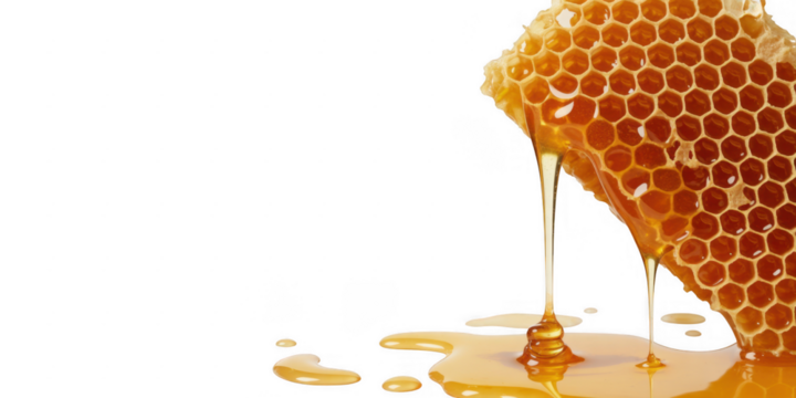 Honeycomb dripping golden liquid onto black surface isolated on a transparent background