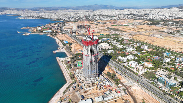 Aerial drone photo of iconic project in development called "The Ellinikon" in coastal waterfornt of glyfada featuring Riviera Tower, Park, Marina and mall facilities, Attica, Greece