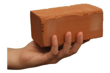 Hand holding a single red clay brick isolated on a transparent background