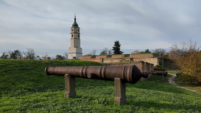 Antique cannon, Sahat kula (Tower Clock) in background, Kalemegdan.  Belgrade, Serbia.