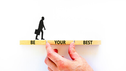 Motivational be your best symbol. Concept words Be your best on beautiful wooden blocks. Beautiful white background. Businessman hand. Business motivational be your best concept. Copy space.