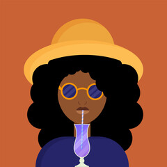 Young African American woman drinks cocktail