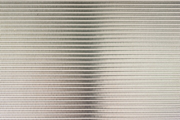 Cells of an automotive aluminum radiator