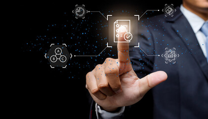 Close-up of businessman in suit touching a virtual screen showing digital icons of documents with check marks and various data analysis symbols.
