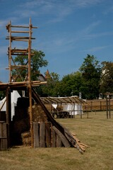 Wooden Watchtower and Hay Stack at a Medieval Reenactment Camp in Dinkelsb&uuml;hl, Germany