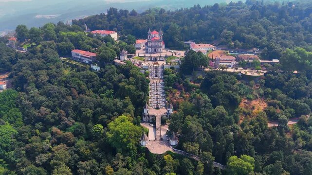 Aerial Cinematic View of Bom Jesus do Monte &mdash; Iconic Baroque Sanctuary and Monumental Staircase Overlooking Braga, Portugal