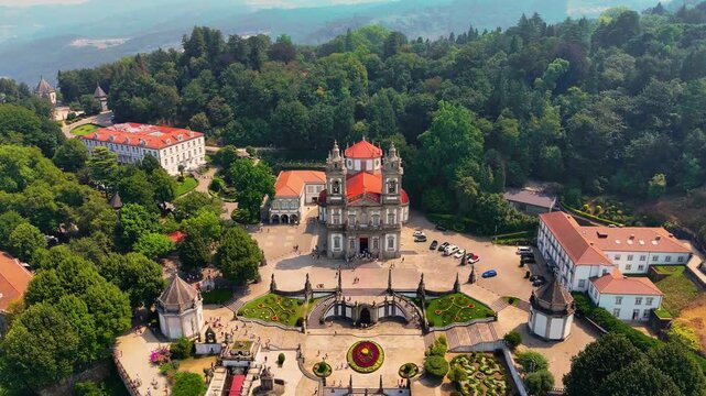 Aerial Cinematic View of Bom Jesus do Monte &mdash; Iconic Baroque Sanctuary and Monumental Staircase Overlooking Braga, Portugal