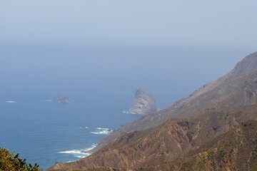 Anaga is a mountain range with sharp edges and deep ravines, covered in a green blanket of laurel forest. It is a protected natural area in Tenerife, Canary Islands, Spain.