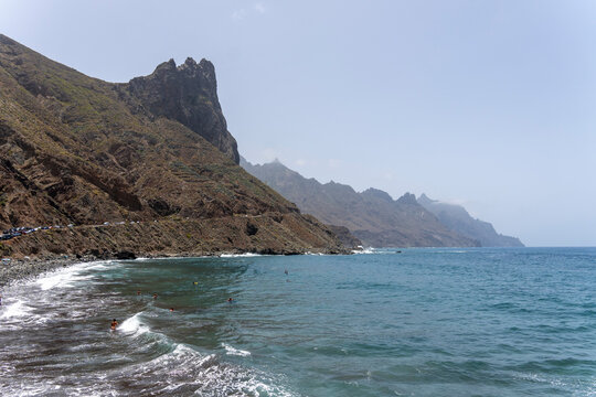 Anaga is a mountain range with sharp edges and deep ravines, covered in a green blanket of laurel forest. It is a protected natural area in Tenerife, Canary Islands, Spain. - Powered by Adobe