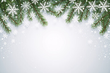 Festive winter background with snowflakes and pine branches