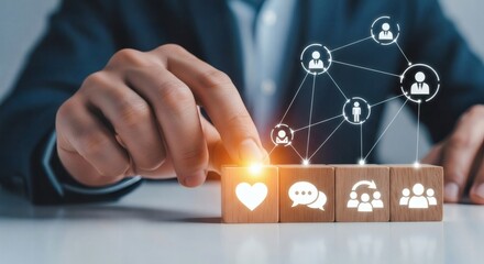 Human connection and team communication concept. Business hand touching illuminated heart icon block surrounded by digital team network connections