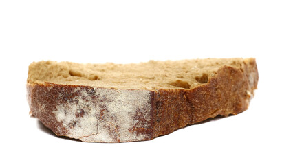 Integral dark bread slice with different seeds isolated on white background, side view