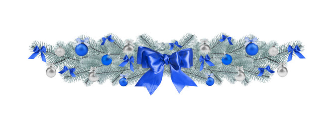 Christmas garland with fir tree branches and festive ornaments on white background