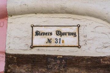 Fototapeta premium A sign with the name 