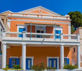 Close up of a colorful neoclassical house, Symi town on Symi island, Greece
