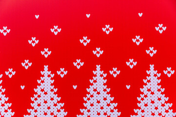 Christmas trees seamless pattern. white christmas trees on red background. Design for textiles, postcards, gift wrapping paper