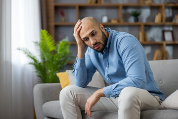 Unhappy man feeling stress, worried about problems