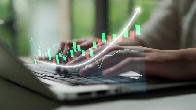 A close-up view of hands typing on a laptop, displaying charts and graphs that illustrate financial growth and data analysis for business strategies. Copula - Powered by Adobe