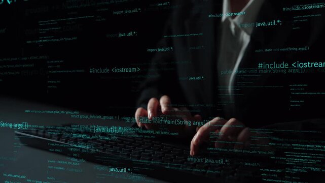 Close-up of hands typing on a keyboard surrounded by floating code snippets in a dark setting, illustrating the dynamic world of software development and technology. Xenic