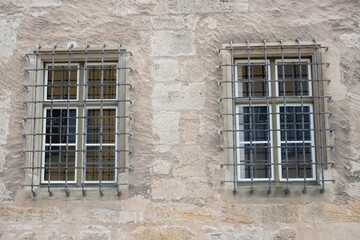 Medieval Stone Wall Windows with Iron Bars
