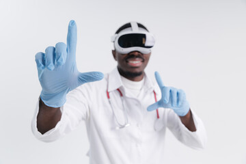 Closeup medical glove, gesture with finger to press button for experiencing virtual reality. African male doctor using vr headset for med innovation